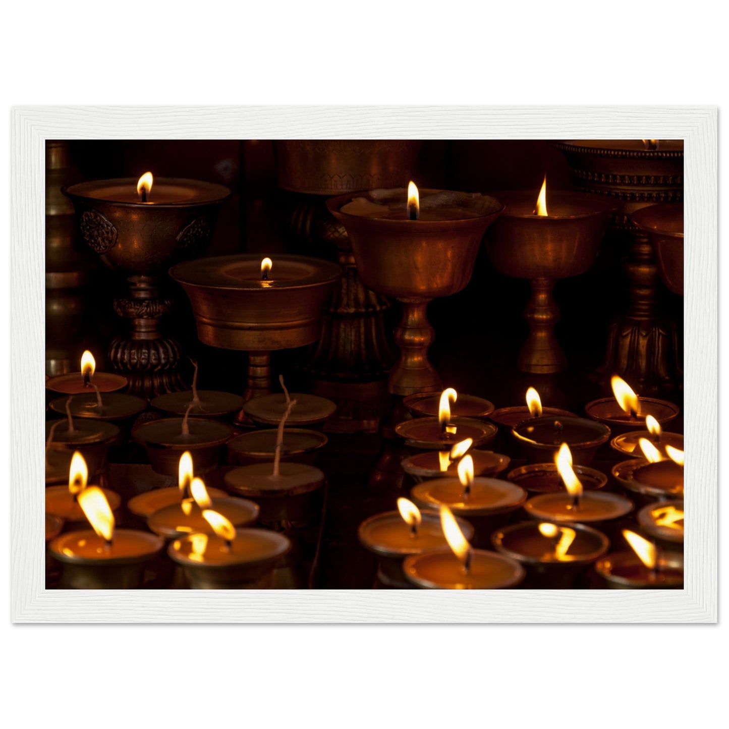 Lit candles at the monkey temple of Kathmandu